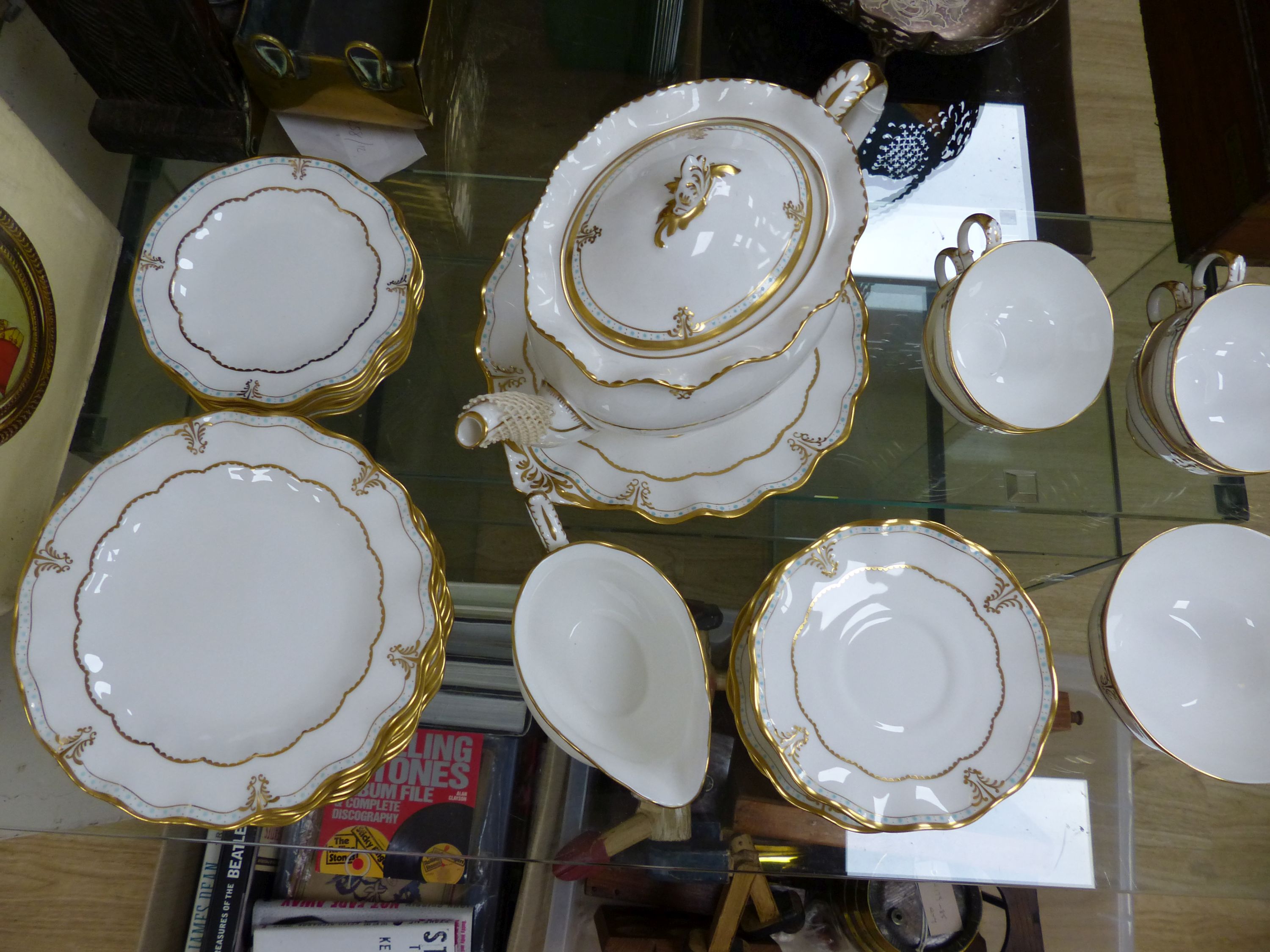 A Royal Crown Derby white bone china tea service with gilt and turquoise decoration, Lombardi pattern